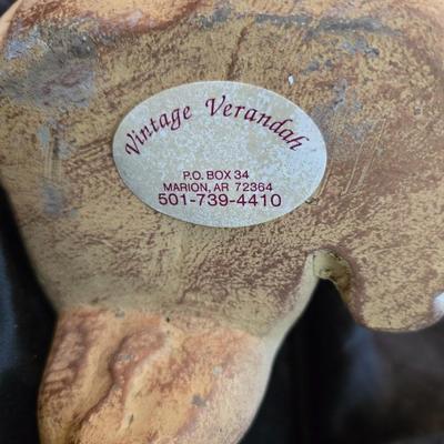 sitting cherub angel garden statue with two faux decorative garden stones