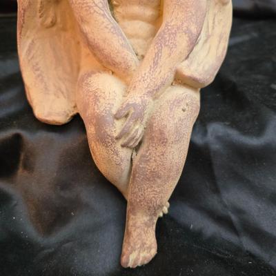 sitting cherub angel garden statue with two faux decorative garden stones