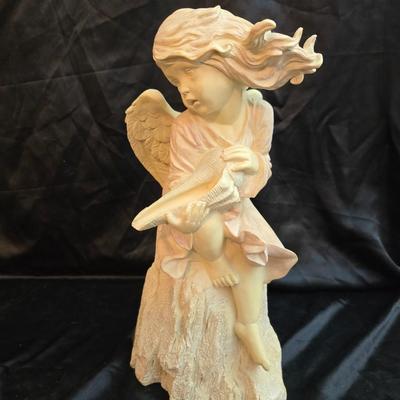 Large angel holding a seashell yard /garden or home art.