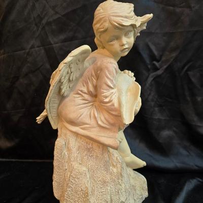 Large angel holding a seashell yard /garden or home art.
