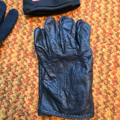 Three pairs of Men's Gloves, two neck Scarves an umbrella