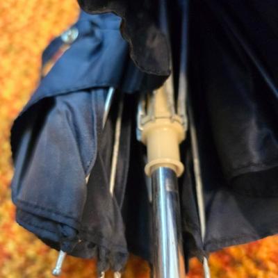 Three pairs of Men's Gloves, two neck Scarves an umbrella