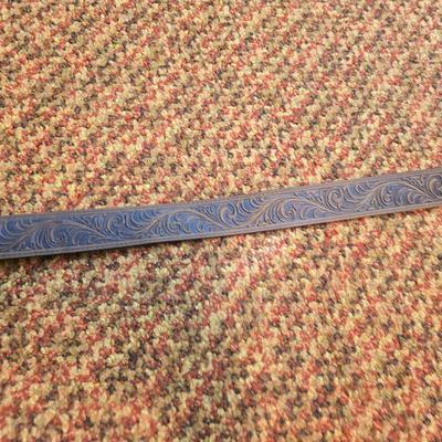 Brand new belt with two brass belt buckles