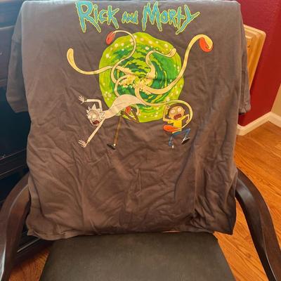 Sale Photo Thumbnail #116: Official Adult Swim Rick and Morty graphic tee featuring portal artwork and Rick & Morty running from tentacles.

Details:

Size: 3XL

Brand: Adult Swim

Color: Dark gray

Condition: Good pre-owned (no major flaws visible)

Popular collectible series with