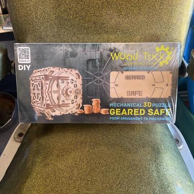 Sale Photo Thumbnail #129: Brand-new, factory-sealed Wood Trick mechanical model kit:
“Geared Safe” – Mechanical 3D Puzzle.

This detailed wooden engineering kit includes:

Precision laser-cut wooden parts

Fully functional gear-driven safe mechanism once assembled

DIY const
