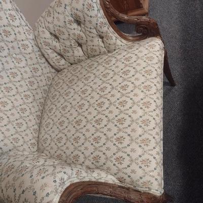 Vintage Wingback Chair with Carved Wood Arms and Legs and Button Tufted Accent
