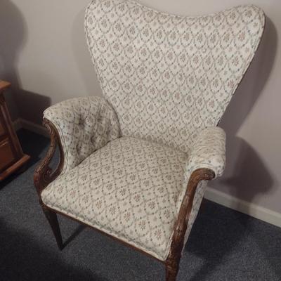 Vintage Wingback Chair with Carved Wood Arms and Legs and Button Tufted Accent