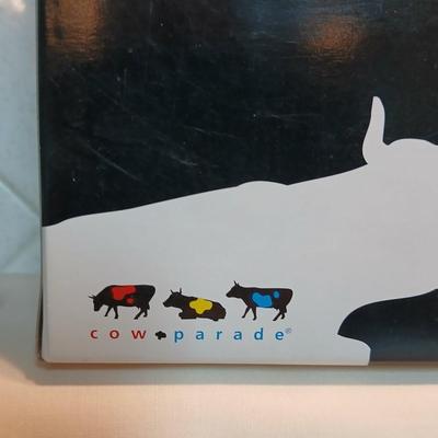 Cow parade Milk Toast with a calf peeking off the shelf