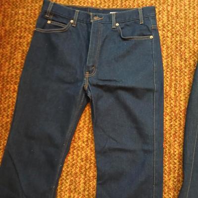 Two pair of like new Brown leather tagged Levi's 517 bootcut jeans in a dark wash with a 36 x 30 size.