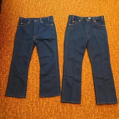 Two pair of like new Brown leather tagged Levi's 517 bootcut jeans in a dark wash with a 36 x 30 size.