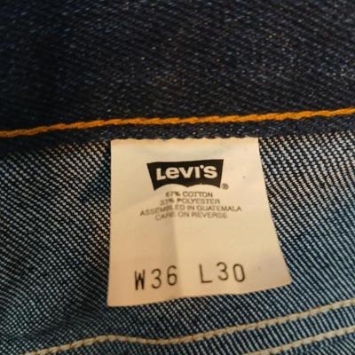 Two pair of like new Brown leather tagged Levi's 517 bootcut jeans in a dark wash with a 36 x 30 size.