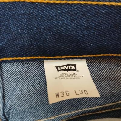 Two pair of like new Brown leather tagged Levi's 517 bootcut jeans in a dark wash with a 36 x 30 size.