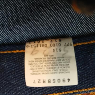 Two pair of like new Brown leather tagged Levi's 517 bootcut jeans in a dark wash with a 36 x 30 size.
