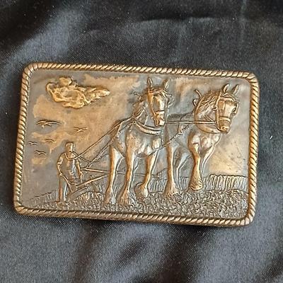 Brass belt buckles - 1976 Bergamot Brass Works "Plow Horse" or "Farmer" belt buckle & a AGLAND of the Rockies buckle