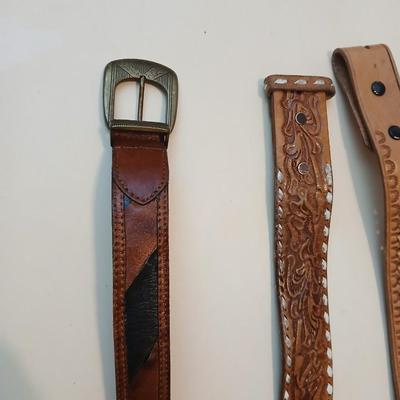 Collection of 4 brown leather belts
