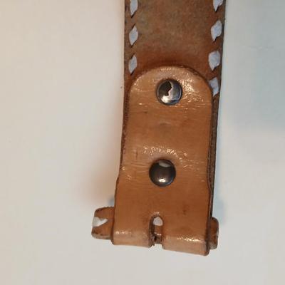 Collection of 4 brown leather belts