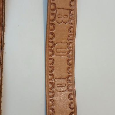 Collection of 4 brown leather belts