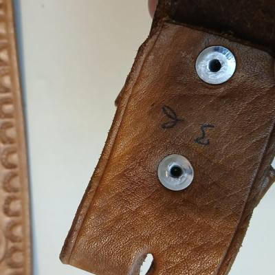 Collection of 4 brown leather belts