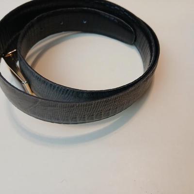 Collection of 4 belts - Black leather and white multi holed