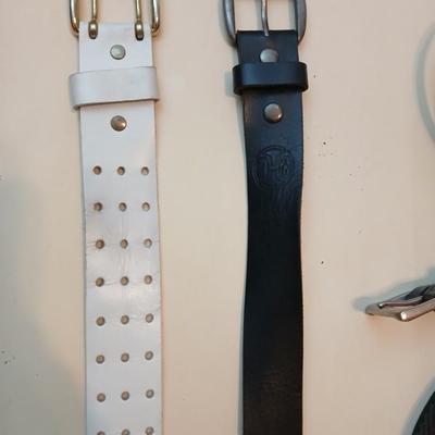 Collection of 4 belts - Black leather and white multi holed