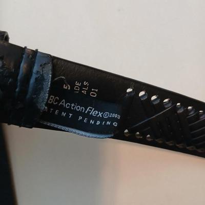 Collection of 4 belts - Black leather and white multi holed