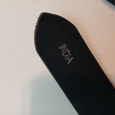 Collection of 4 belts - Black leather and white multi holed