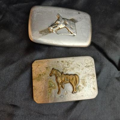 Two horse themed belt buckles -vintage Ricardo nickel silver and bronze western belt buckle & a vintage Lyn Tone Co. horse head buckle