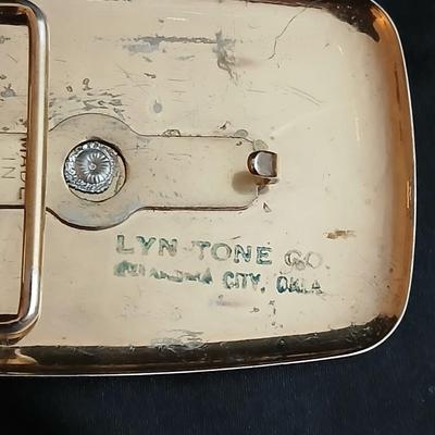 Two horse themed belt buckles -vintage Ricardo nickel silver and bronze western belt buckle & a vintage Lyn Tone Co. horse head buckle