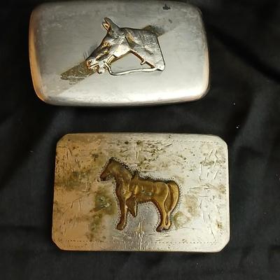 Two horse themed belt buckles -vintage Ricardo nickel silver and bronze western belt buckle & a vintage Lyn Tone Co. horse head buckle