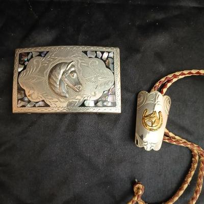 Mexico Alpaca silver toned and abalone inlaid belt buckle featuring a horse head design with a bolo tie clip featuring a horse