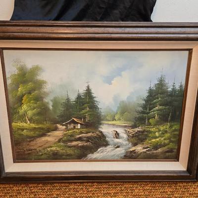 Vintage original framed oil painting on canvas signed Mallins, featuring a riverside cabin landscape scene.