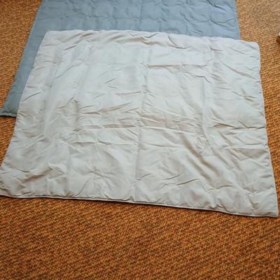 Three down filled throw blankets