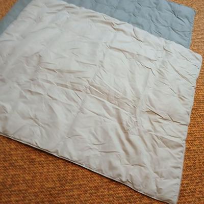 Three down filled throw blankets