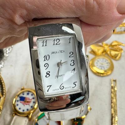 Sale Photo Thumbnail #175: All watches are from one collection, none of them are running assume all need new batteries or maybe other work. 1 Vintage non working pocket watch. Cuff watches, some stones and crystal. Watch bands.