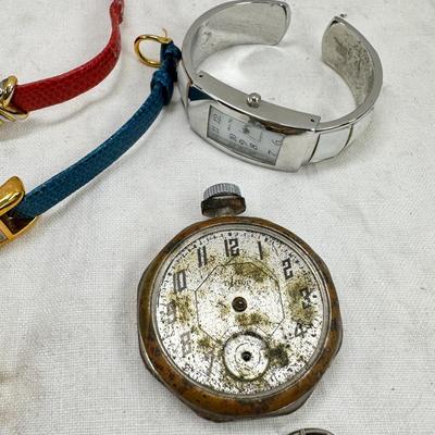 Sale Photo Thumbnail #170: All watches are from one collection, none of them are running assume all need new batteries or maybe other work. 1 Vintage non working pocket watch. Cuff watches, some stones and crystal. Watch bands.