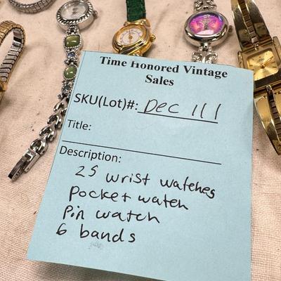 Sale Photo Thumbnail #177: All watches are from one collection, none of them are running assume all need new batteries or maybe other work. 1 Vintage non working pocket watch. Cuff watches, some stones and crystal. Watch bands.