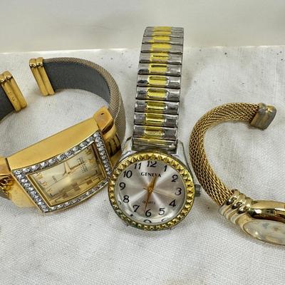 Sale Photo Thumbnail #171: All watches are from one collection, none of them are running assume all need new batteries or maybe other work. 1 Vintage non working pocket watch. Cuff watches, some stones and crystal. Watch bands.