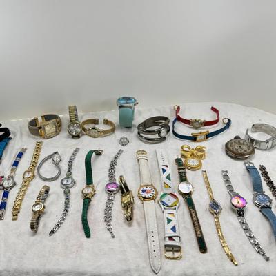 Sale Photo Thumbnail #178: All watches are from one collection, none of them are running assume all need new batteries or maybe other work. 1 Vintage non working pocket watch. Cuff watches, some stones and crystal. Watch bands.