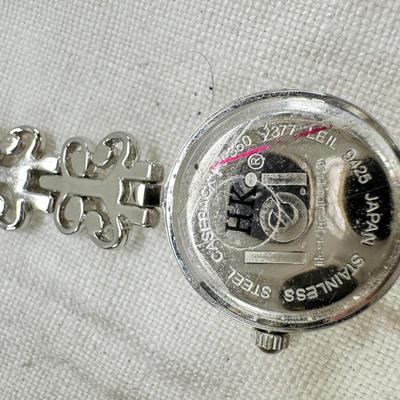 Sale Photo Thumbnail #183: All watches are from one collection, none of them are running assume all need new batteries or maybe other work. 1 Vintage non working pocket watch. Cuff watches, some stones and crystal. Watch bands.