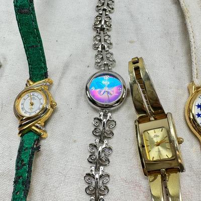 Sale Photo Thumbnail #174: All watches are from one collection, none of them are running assume all need new batteries or maybe other work. 1 Vintage non working pocket watch. Cuff watches, some stones and crystal. Watch bands.