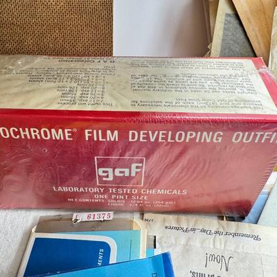 Sale Photo Thumbnail #191: Slides in trays, negatives, Black and white 1940s photos, Color prints 1960s Boxes of slides. If you like a mystery these slides and photos will be a fun project. There are also a lot of empty celluloid envelopes .