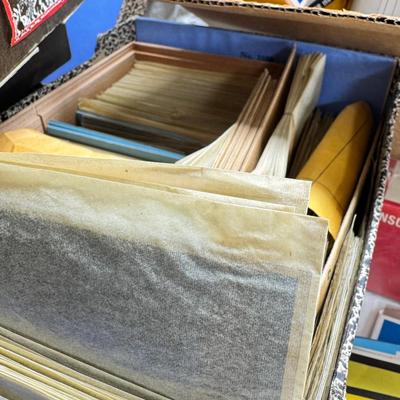 Sale Photo Thumbnail #193: Slides in trays, negatives, Black and white 1940s photos, Color prints 1960s Boxes of slides. If you like a mystery these slides and photos will be a fun project. There are also a lot of empty celluloid envelopes .