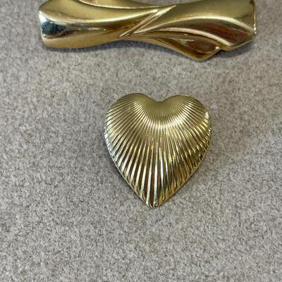 3 gold tone brooches