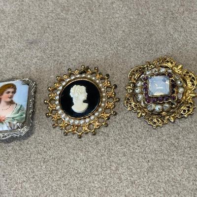 Vintage cameo pendant and 2 brooches that need some work