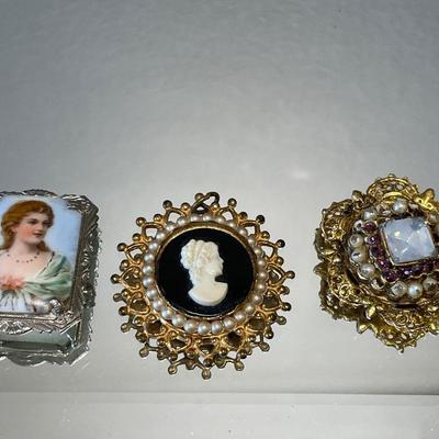 Vintage cameo pendant and 2 brooches that need some work