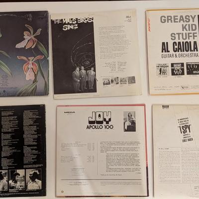 Sale Photo Thumbnail #174: A vibrant and varied mix of mid-century and 1970s/80s vinyl, perfect for crate-diggers, decorators, and collectors of unique cover art. This lot features jazz fusion, classic vocal harmony, orchestral pop, and iconic television soundtrack music.

Includes