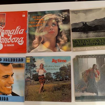 Sale Photo Thumbnail #180: Includes:

Imalia Mendoza – La Tariacuri (Mexican traditional ranchera; glossy red cover)

Music From Sweden – NK Presents a Collection of Best Loved Swedish Music

Calum Kennedy – Skyline of Skye (Scottish folk / Ace of Clubs label)

Julio Iglesias