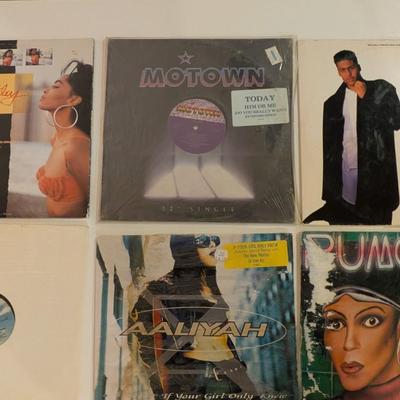 Sale Photo Thumbnail #183: A mixed lot of collectible late-80s and ’90s R&B / New Jack Swing / Hip-Hop 12” singles. Several sleeves show heavy wear, but vinyl appears generally presentable. Includes one highly desirable Aaliyah single and a classic Timex Social Club cut.

Inclu