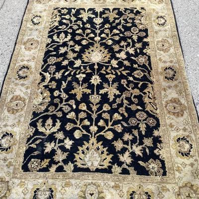 Sale Photo Thumbnail #19: This is a nice 72 x 42 area rug it has blue and tan colors.  It needs to be cleaned but is very nice.