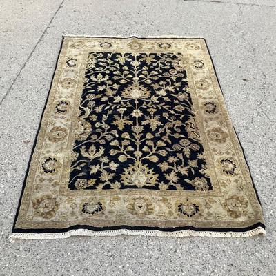 Sale Photo Thumbnail #18: This is a nice 72 x 42 area rug it has blue and tan colors.  It needs to be cleaned but is very nice.